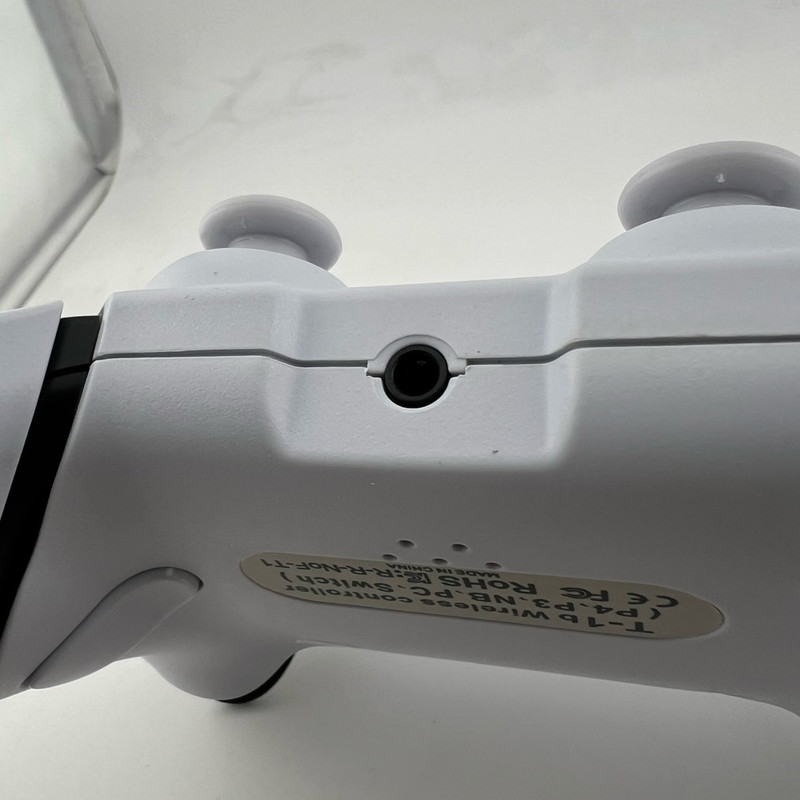 دسته بازی بی سیم مخصوص پلی استیشن 4 مدل T-1B 17 دسته بازی بی سیم مخصوص پلی استیشن 4 مدل T-1B